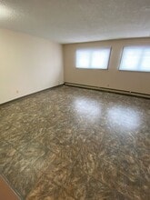 Building Photo - 10303-10396 96 Ave