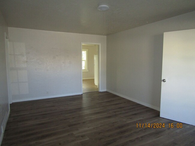 Building Photo - New listing-fresh paint and hard surface f...