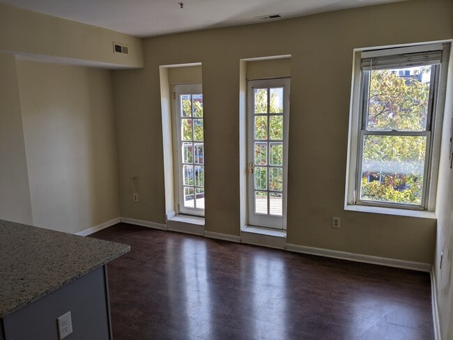 Open plan kitchen / living / dining space leading out to front deck - 1912 9th St NW