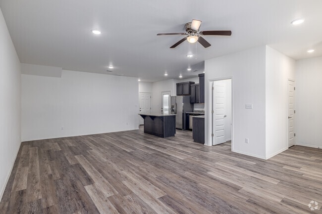 3BR, 3.5BA - 1,750SF - Living Room - Towne West