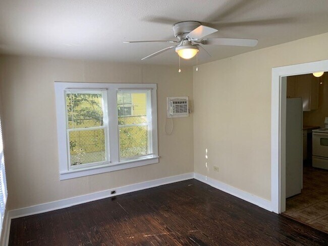 Building Photo - *COMING SOON* Charming Cottage Retreat with Fenced Yard!