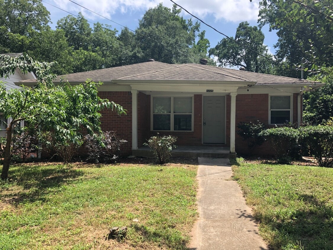Front of house. Peach and pear trees in front yard - 1225 Hosea L Williams Dr SE