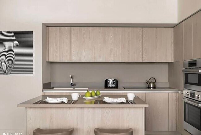 Foto del edificio - Stunning High-Floor City View 1BR Hyde Bea...