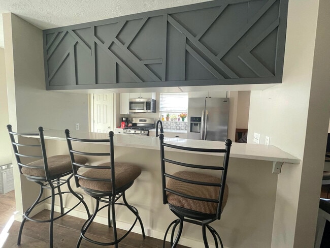 Bar eating area - 7014 S Cannon Place Dr