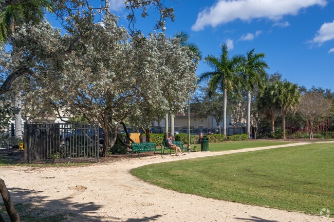 Someone Relaxing in the bench Park.