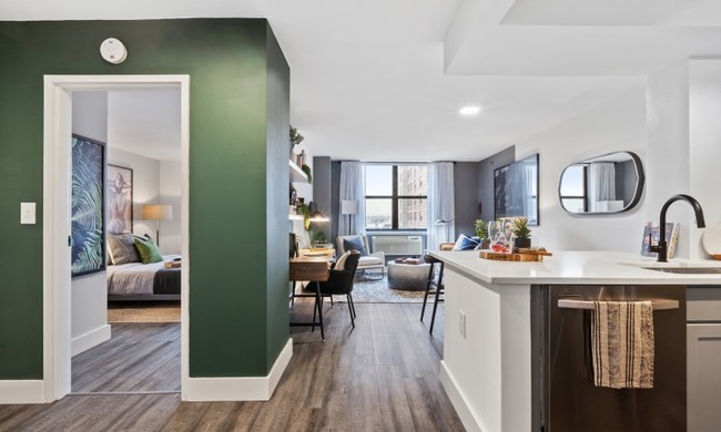 Open floor plan of kitchen looking into living room - Observer Park