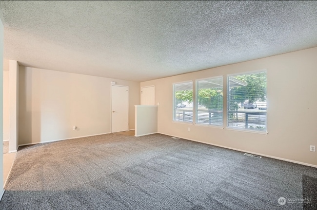 Building Photo - 1411 100th St S