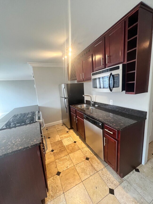 Foto del edificio - 700 E 8th St Unit 12E