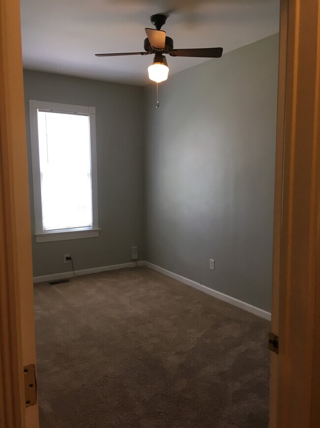 Smaller bedroom. - 611 E Martin St