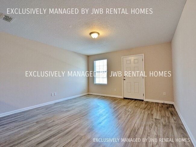 Building Photo - 8515 McGirts Village Ln