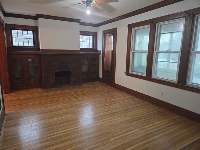 Living room built in shelving, non working fireplace - 467 Maplewood Ave