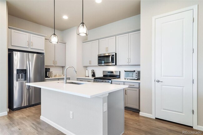 Building Photo - New ranch style home with a finished basem...