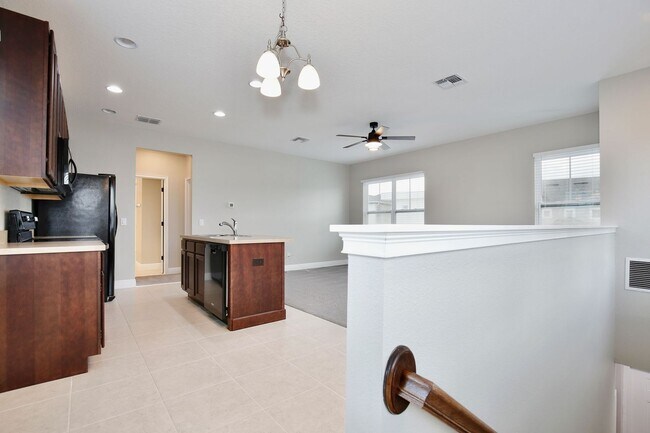 Foto del edificio - *Unfurnished* Beautiful 1/1 Spacious Garage Apartment in the Exclusive Laureate Park - Orlando!