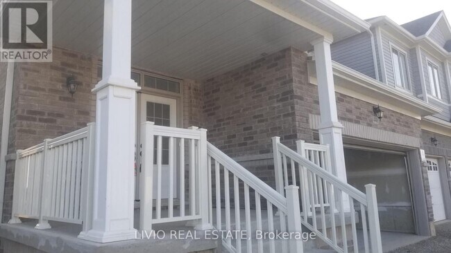 Photo du bâtiment - 448 Black Cherry Cres