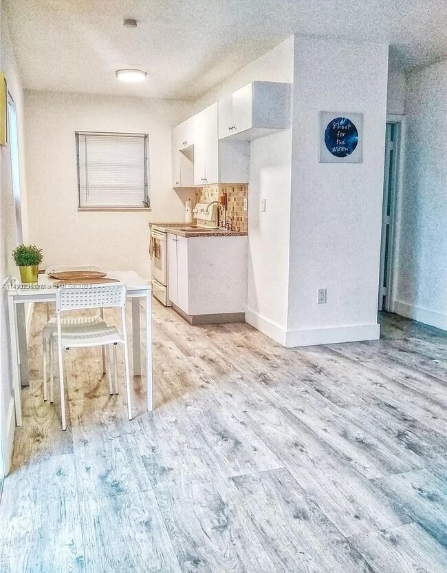 Dining/full kitchen - 142 NE 56th St