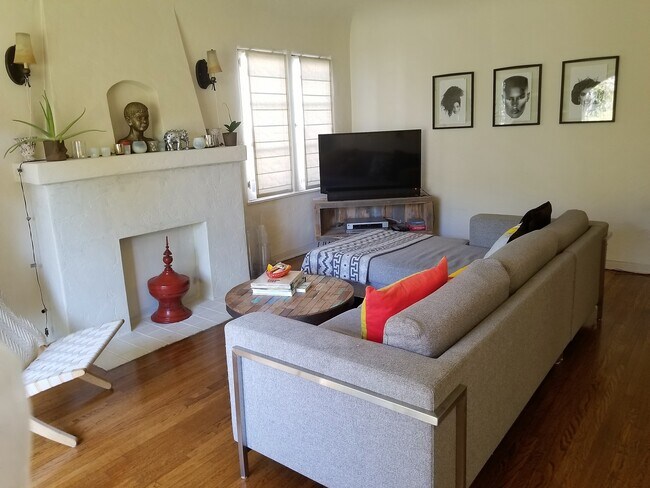 living room with fireplace and hardwood floors - 1362 S Mansfield Ave