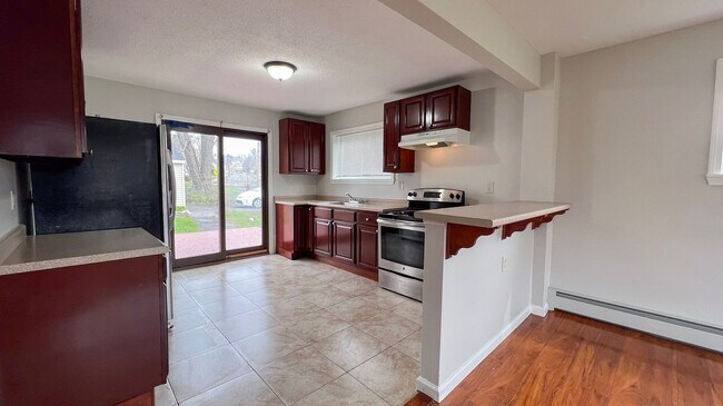 Building Photo - Four Bedroom Single-Family Home