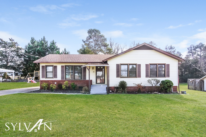 Primary Photo - The charming 3BR 1.5BA home is ready for n...