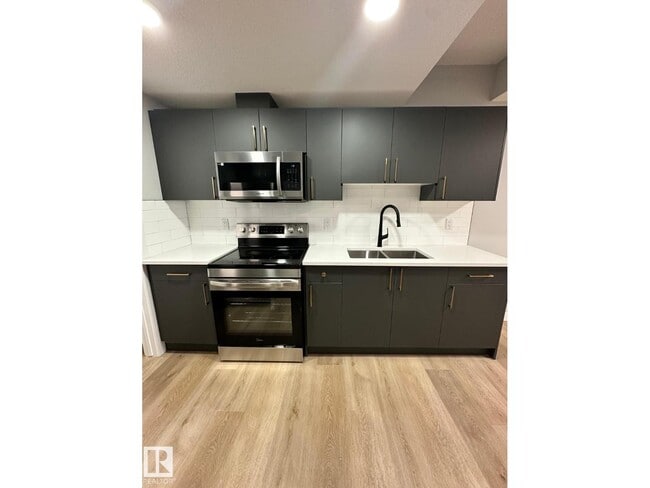 Photo du bâtiment - #BSMT 3922 40 AV