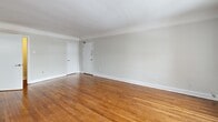 Located at 120 St Paul Ave in Brantford, Ontario, this 2-bedroom, 1-bathroom unit offers a practical and well-laid-out floor plan across a single level. Warm-toned hardwood flooring extends throughout the living areas and bedrooms, lending a timeless character to the space.

The spacious living room is a standout feature, bathed in natural light through a large multi-pane window and finished with a charming arched passageway leading deeper into the unit. A radiator provides reliable in-unit heating. The open, neutral-toned walls create a clean, versatile backdrop throughout.

The kitchen is equipped with white cabinetry, granite-look countertops, stainless steel appliances including a range, over-the-range microwave, and refrigerator, along with a window above the sink for natural light. Tile flooring completes the kitchen area.

Both bedrooms feature hardwood floors and radiator heating, with windows offering views of the surrounding neighbourhood. The primary bedroom is a comfortable size, while the second bedroom provides ample flexibility. A dedicated closet adds convenient storage.

The full bathroom is finished with white wall tiles, a tub and shower combination, and a window for ventilation and natural light. A hallway connects all rooms, providing a well-organized flow throughout this charming Brantford residence.