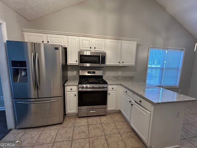 Building Photo - 5774 Tattersall Terrace