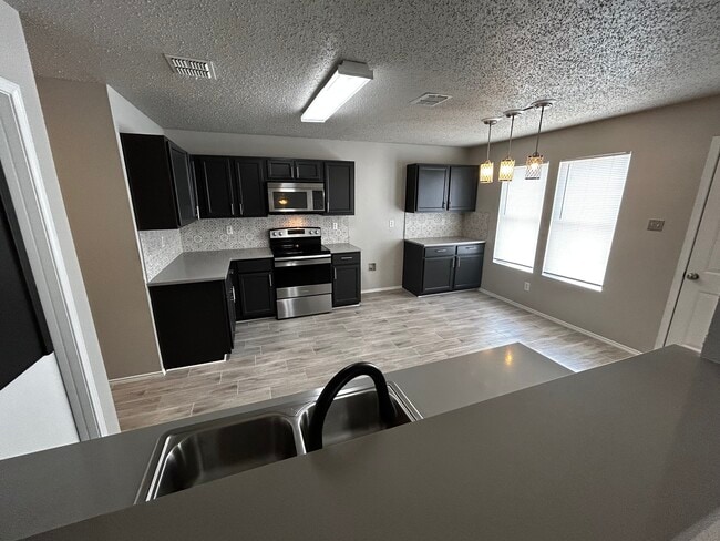 Foto del edificio - 8720 Hunters Creek Dr