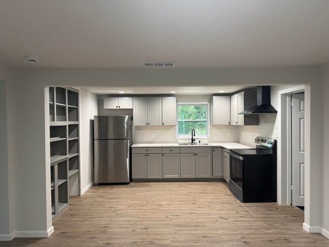 Foto del edificio - 5057 Tillie Ln