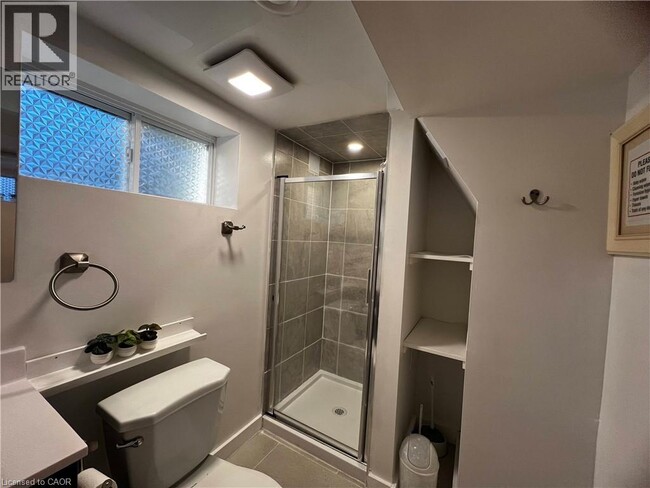 Building Photo - 4424 SIXTH Avenue Unit# BSMT