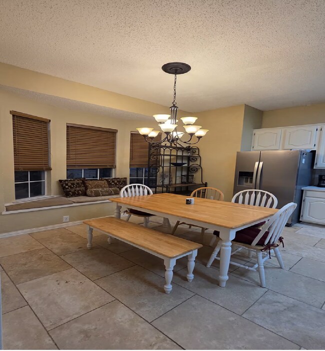 Gather with your family in the refined comfort of an inviting kitchen - 10913 Alexandria Dr
