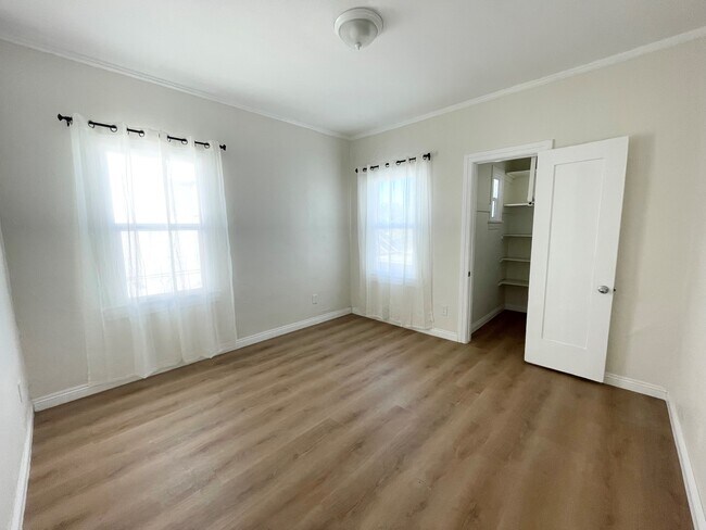 Bedroom 2 w/new dual paned windows - 518 N Spaulding Ave