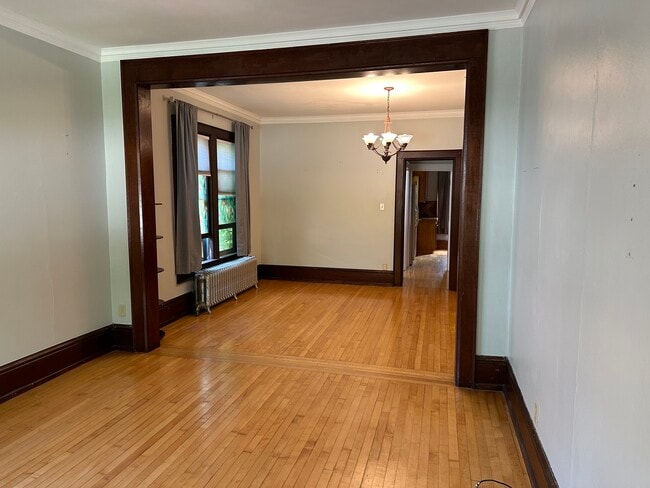 Living room/dining room - 1045 S Webster Ave