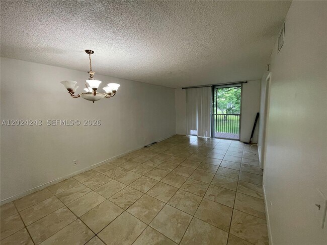 Building Photo - 8750 N Sherman Cir