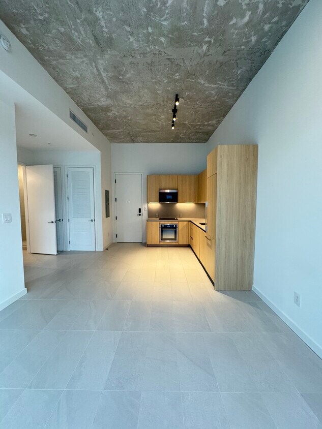 KITCHEN FROM LIVING ROOM - 112 NW 31st St