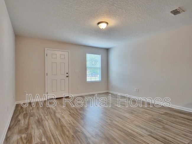 Building Photo - 8492 McGirts Village Ln