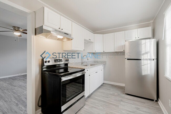 Building Photo - NOW OFFERING HALF OFF THE FIRST FULL MONTH...