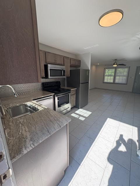 Building Photo - "Cozy 2-Bedroom Retreat with Granite Elega...