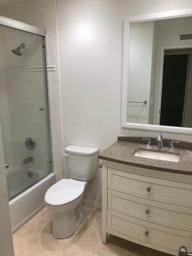 Bathrooms recently remodeled. New tile showers, stone floors, new vanities and toilets. - 10175 El Corazon Ave