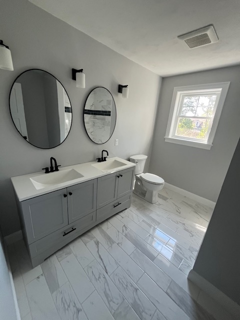 Double vanities & Fully tiled showers - 159 Washington St