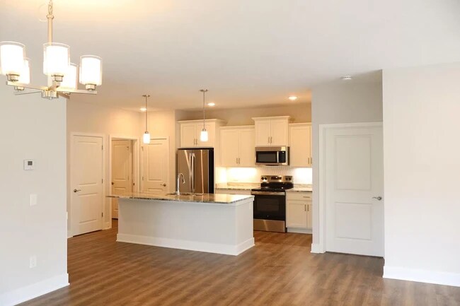 Open kitchen and large dining room - 6575 Clearwater Ct