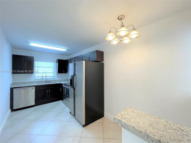 Building Photo - 7830 Dickens Ave