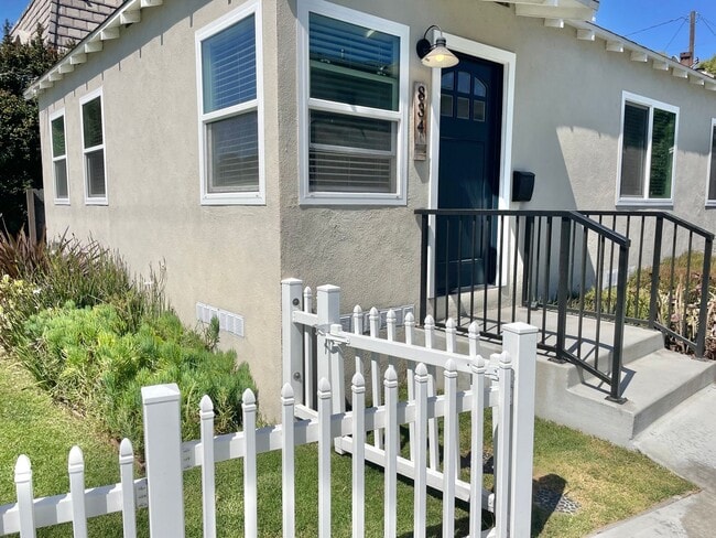 Photo - Large Private Yard, New Flooring & Free Laundry in Renovated 1BD Apartment