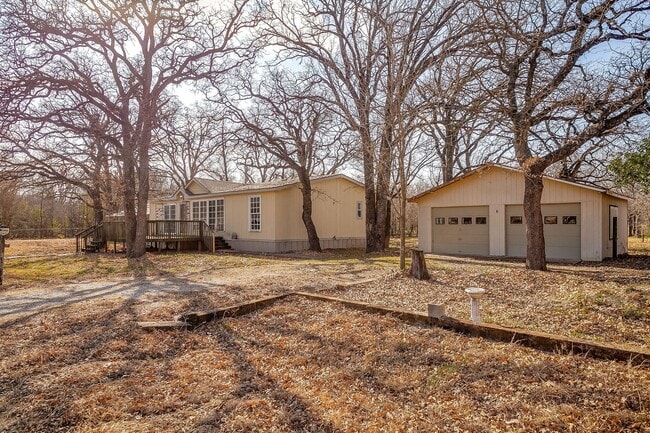 Building Photo - Large 3 Bedroom, 2 Bath Doublewide on 1/2 an Acre- Carport with Garage- Ready for New Tenants- Bu...