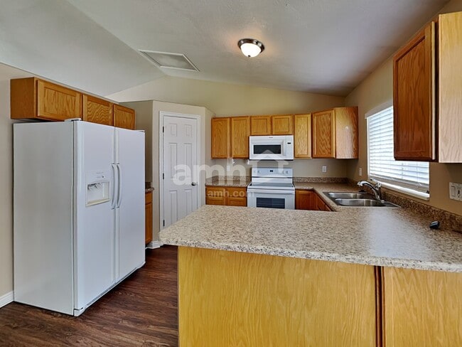 Building Photo - 6396 S Battle Creek Ct