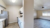 Located at 8429 N 27th Ave in Phoenix, Arizona, this 2-bedroom, 2-bathroom single-floor residence offers a well-organized layout with modern finishes throughout. Wood-look plank flooring runs seamlessly across the living areas and bedrooms, providing a cohesive and contemporary aesthetic. The open living area is highlighted by vaulted ceilings, a ceiling fan with light fixture, and a window that brings in natural light and outdoor views of the surrounding greenery. A modern geometric pendant light adds a stylish focal point above. The kitchen is efficiently designed and equipped with stainless steel appliances, including an electric range with overhead microwave and a full-size refrigerator, complemented by white cabinetry and a clean countertop. A convenient in-unit stacked washer and dryer is tucked neatly within the main living space. Both bedrooms feature vaulted ceilings, ceiling fans, sliding-door closets, and windows with views of the outdoors. The two bathrooms are finished with white vanities, marble-style tile surrounds, and wood-look flooring — one offering a tub/shower combo and the other a standalone sliding-glass shower enclosure. A connecting hallway ties the layout together for easy navigation throughout the home.