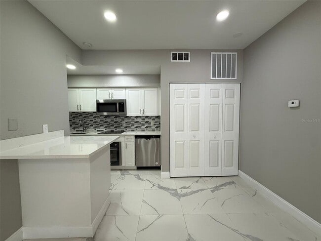 Building Photo - 9258 Lake Chase Island Way