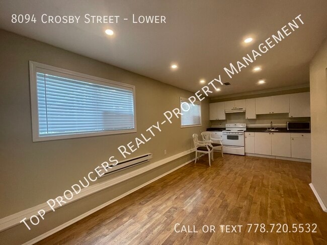 Building Photo - Bright 1 Bedroom Ground Level Suite