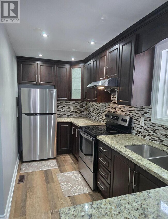 Photo du bâtiment - 59 Reigate Ave