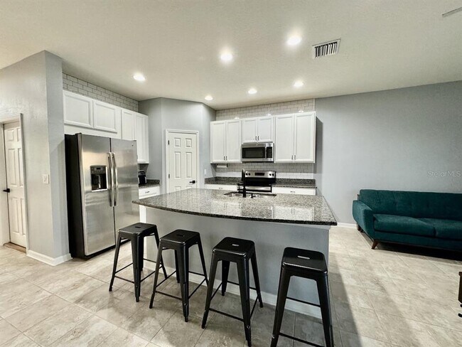 Foto del edificio - 7047 Towne Lake Rd