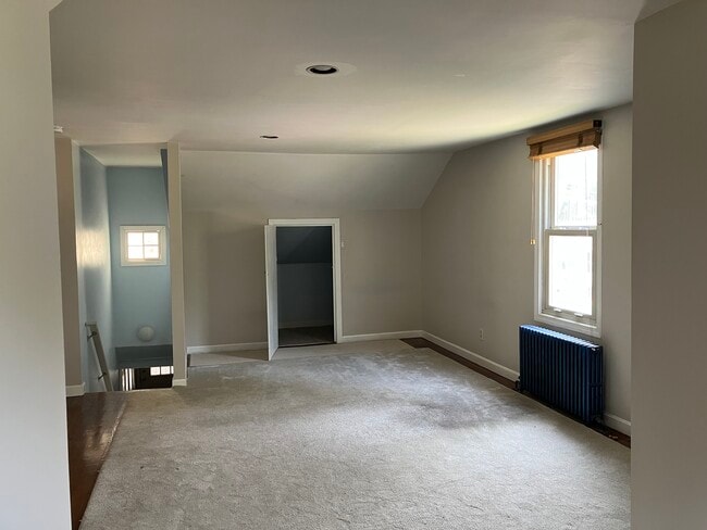 View of entry and one bedroom with storage in one direction - 126 Clover Hill St