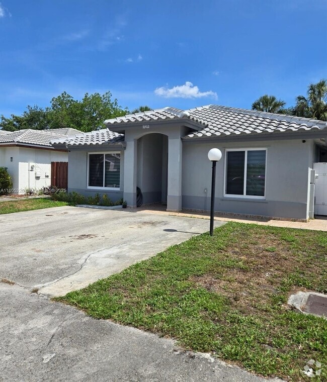 Building Photo - 18402 NW 56th Pl